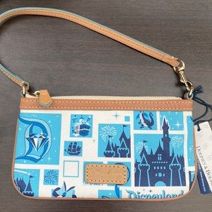 Dooney & Bourke Blue and Tan Disneyland Castle Wristlet